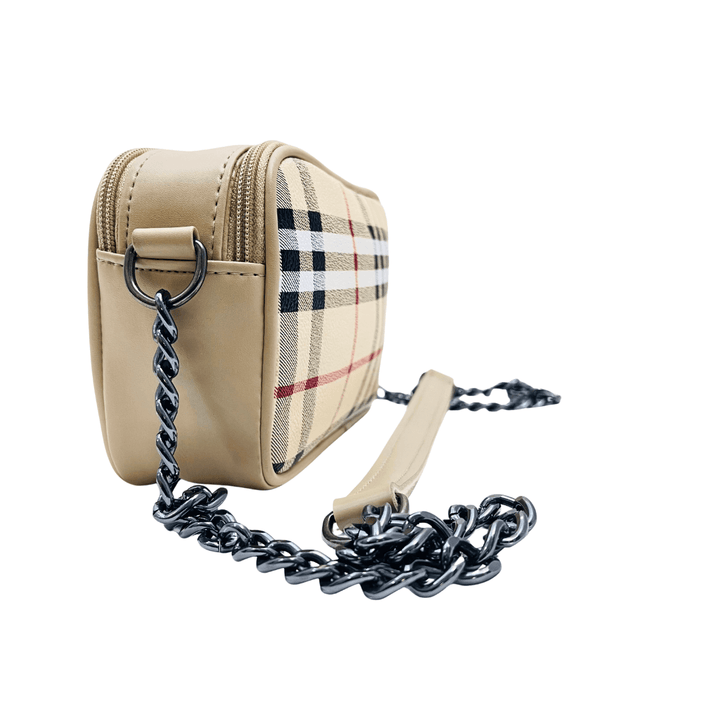 Luxury inspired Antaaj crossbody bag with faux feather material, long chain strap, and dual zipper compartments.