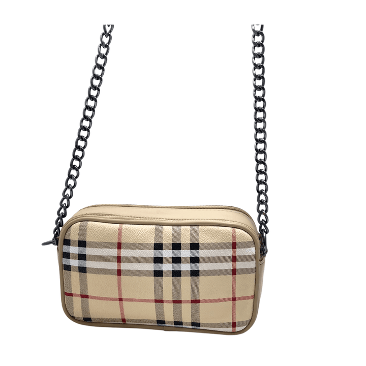 Luxury inspired Antaaj crossbody bag with faux feather material, long chain strap, and dual zipper compartments.