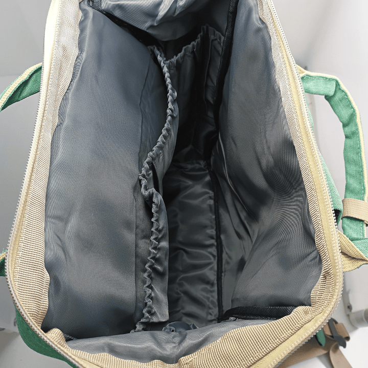 Highly organized Antaaj diaper backpack with multiple compartments, bottle holders and back access zipper.