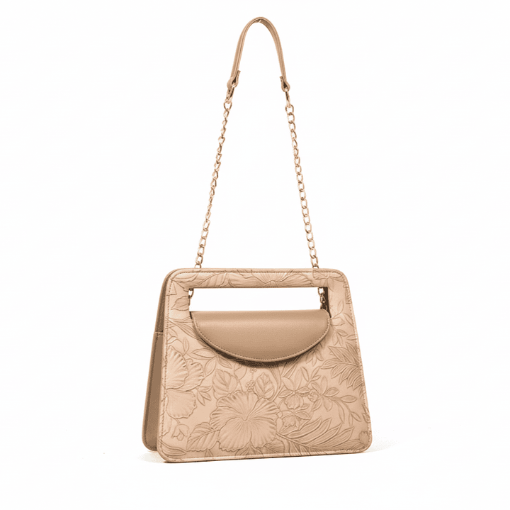 Elegant Antaaj faux leather shoulder bag with a delicate imposed floral design and a chic gold-tone chain strap.