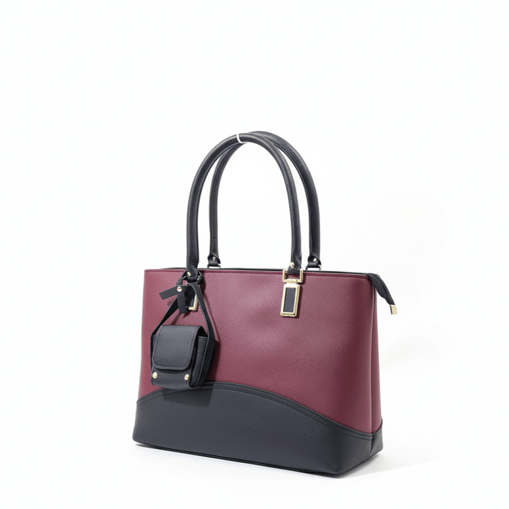 Elegant Antaaj executive tote bag in smooth faux leather with multiple zip pockets including center compartment and front access.