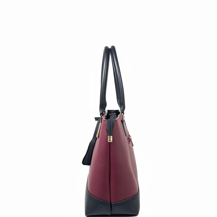 Elegant Antaaj executive tote bag in smooth faux leather with multiple zip pockets including center compartment and front access.