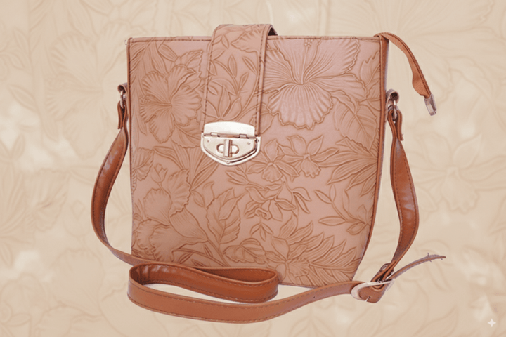 Modern Antaaj crossbody bag with floral print, long strap, metal twist lock closure, and back slip pocket.