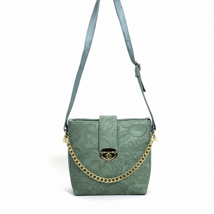 Modern Antaaj crossbody bag with floral print, long strap, metal twist lock closure, and back slip pocket.