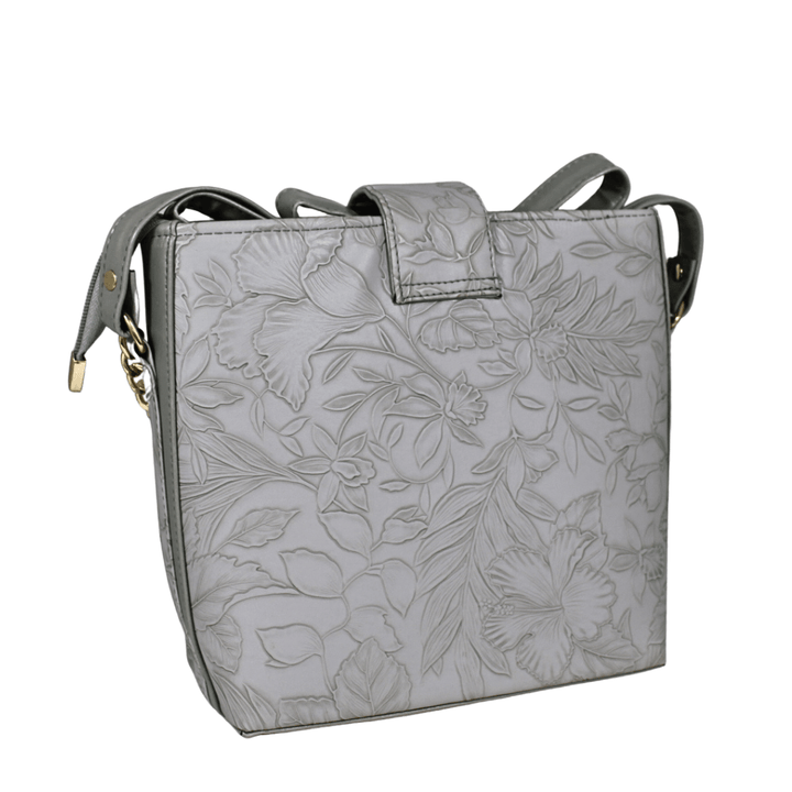 Modern Antaaj crossbody bag with floral print, long strap, metal twist lock closure, and back slip pocket.