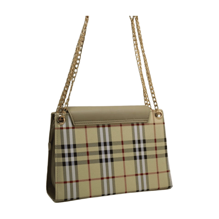 Elegant Antaaj plain faux leather crossbody bag with a long chain strap and magnetic flap closure.