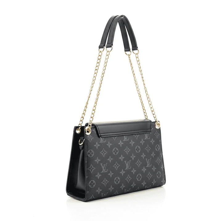 Elegant Antaaj plain faux leather crossbody bag with a long chain strap and magnetic flap closure.