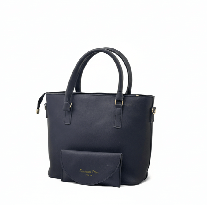 Elegant Antaaj professional tote bag in smooth faux leather with center zipper pocket, inner pouch, and full zip closure.