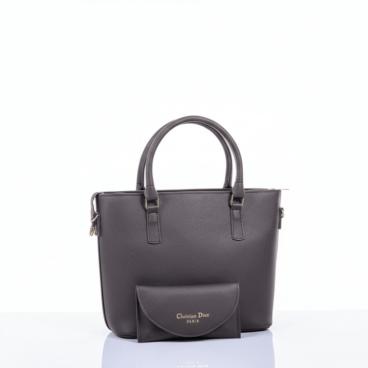 Elegant Antaaj professional tote bag in smooth faux leather with center zipper pocket, inner pouch, and full zip closure.