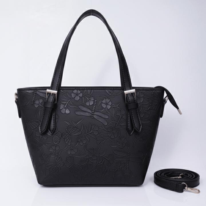 Elegant Antaaj textured shoulder bag with long strap, faux leather, and multiple internal zipper compartments.