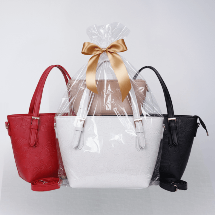 Elegant Antaaj textured shoulder bag with long strap, faux leather, and multiple internal zipper compartments.