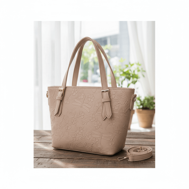 Elegant Antaaj textured shoulder bag with long strap, faux leather, and multiple internal zipper compartments.